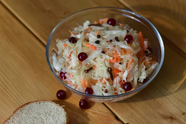 Marinated cranberries in cabbage — Stock Photo, Image