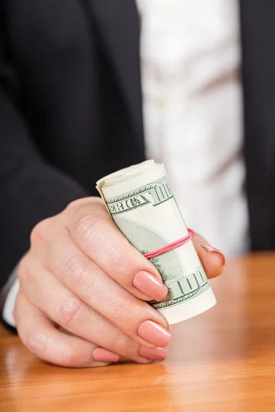 Woman giving money closeup — Stock Photo, Image