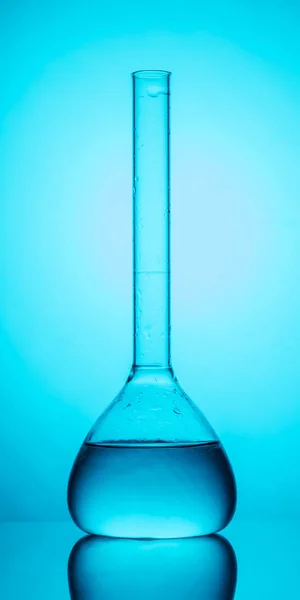 Chemical flask with liquid — Stock Photo, Image