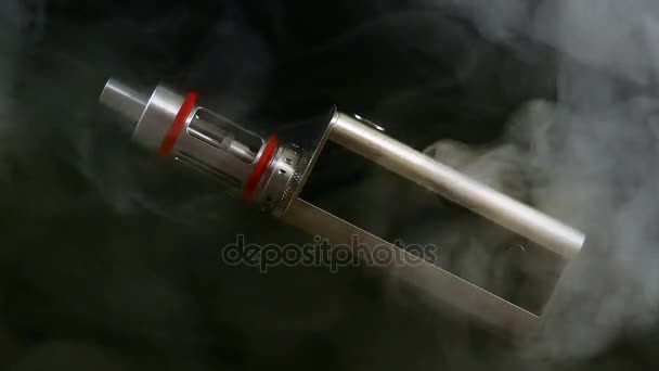 Electronic cigarette close-up in smoke — Stock Video