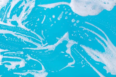 sabun köpük mavi bir arka plan üzerinde