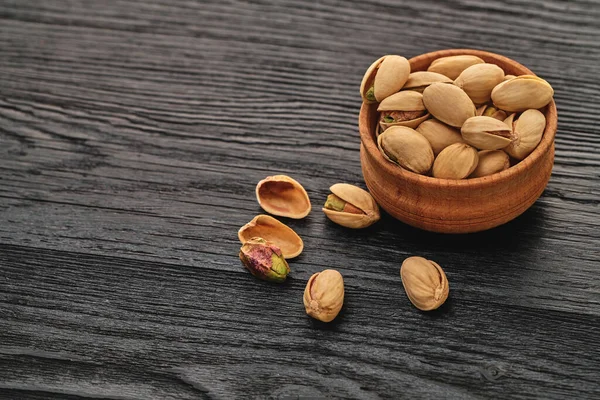 Pistachios Bowl Black Wooden Background — Stock Photo, Image