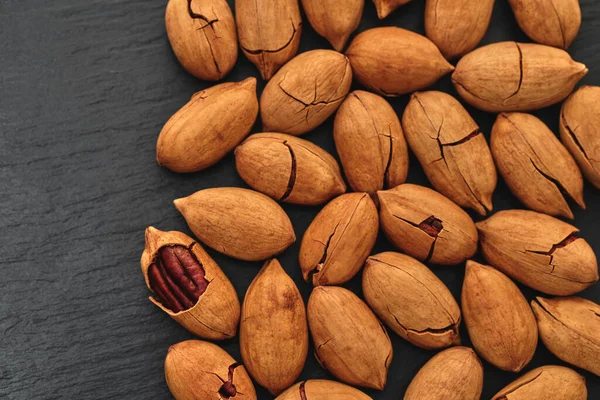 Pecan Nut Close Black Stone Background — Stock Photo, Image