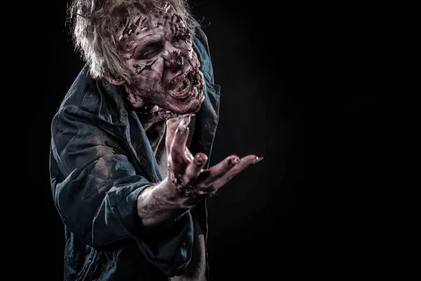 Bloedend zombie man met hersenen uit horror halloween — Stockfoto