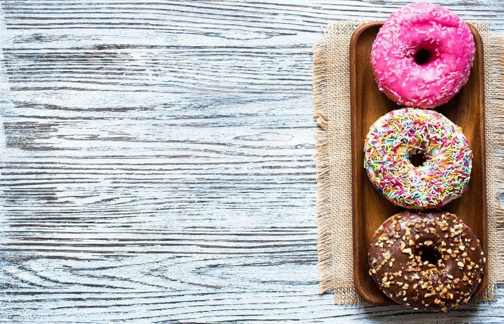 Colorful Donuts breakfast composition