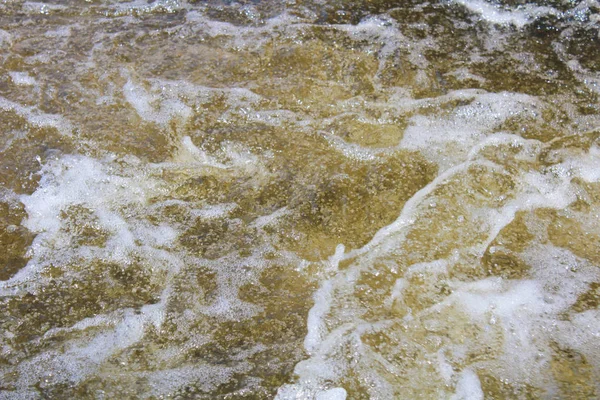 Textura de agua bajo el vertedero — Foto de Stock