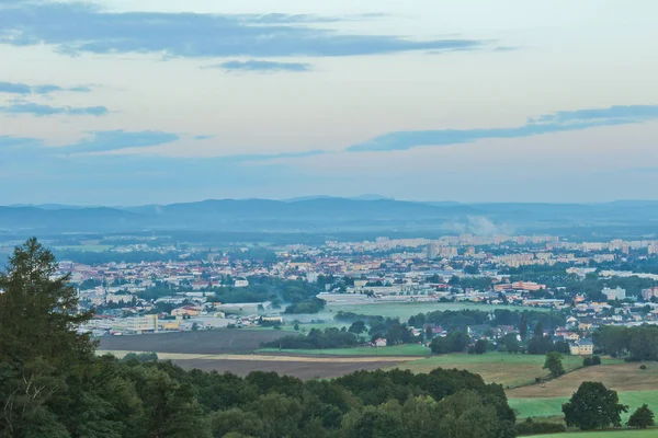 Ceske Budejovice in morning fog with trees in front, Czech lands — Stock Photo, Image