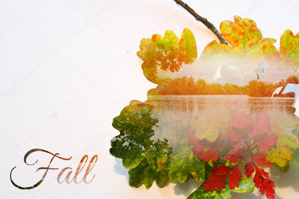 Fall double exposure in colorful leaves and sunset on pond with 
