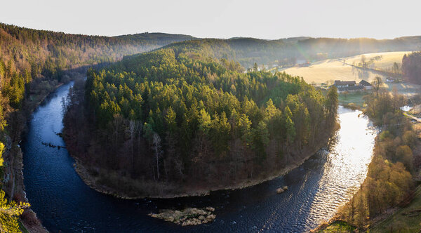 Vltava horseshoe river near ruin Divci kamen at sunrise. Czech republic