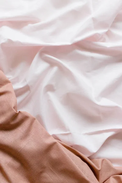 Pale pink crumpled linens. Place for your design, text, etc.