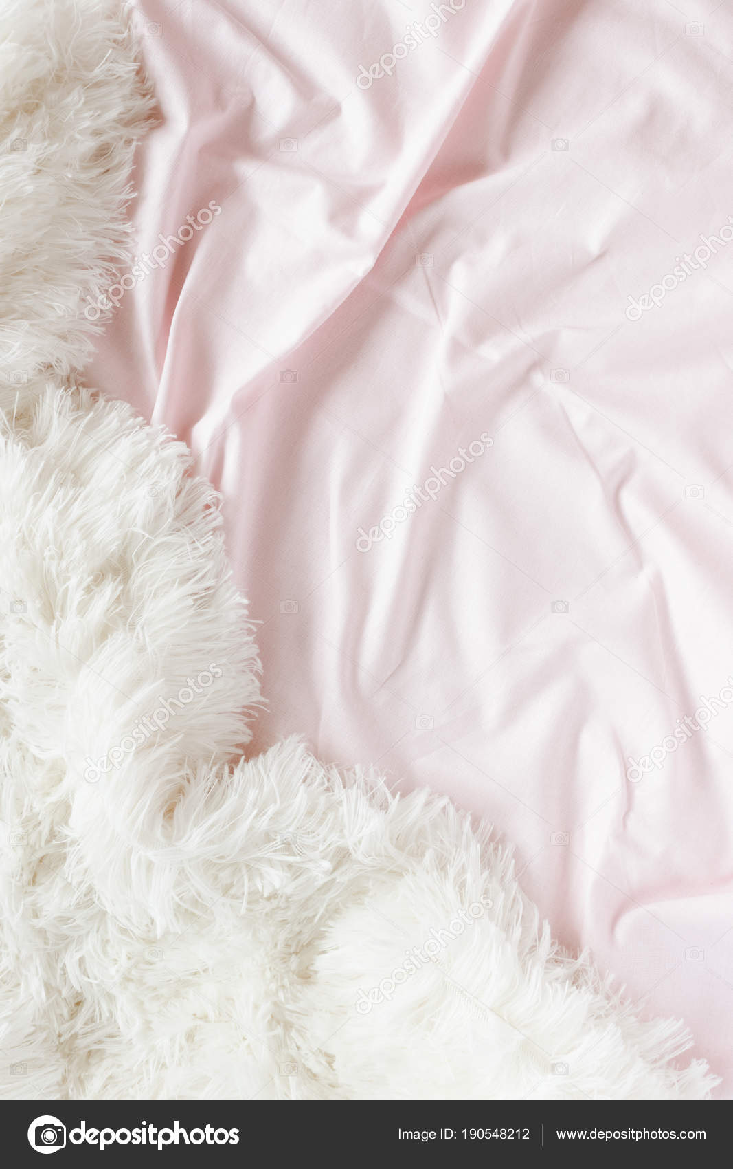 Pale Pink Linens White Fluffy Blanket Stock Photo