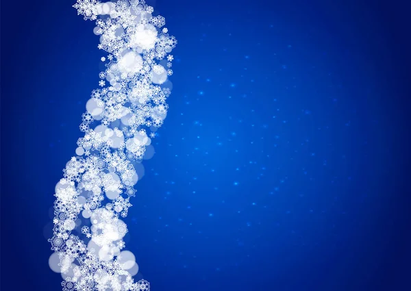 青色の背景に落ちる雪 — ストックベクタ
