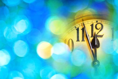 Detail of new year clock with blue background clipart