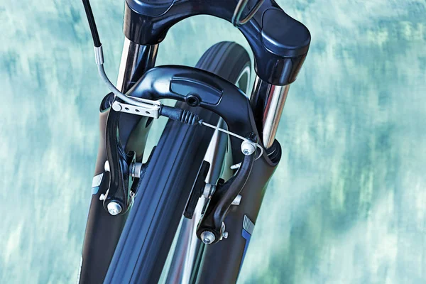 Detail of Caliper Brakes and Suspension Fork — стоковое фото