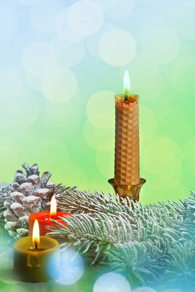 Three Christmas Candles on the Green Background — Stock Photo, Image