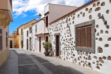 Street View of Old Town of Aguimes. Rural Town and Major Tourist clipart