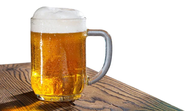 Glas Bier auf dem Holztisch — Stockfoto