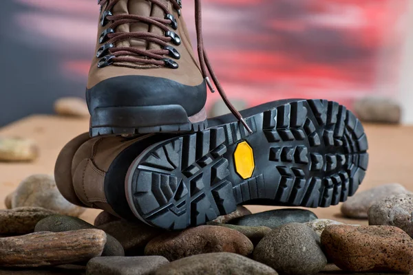 Pair of walking boots in the studio