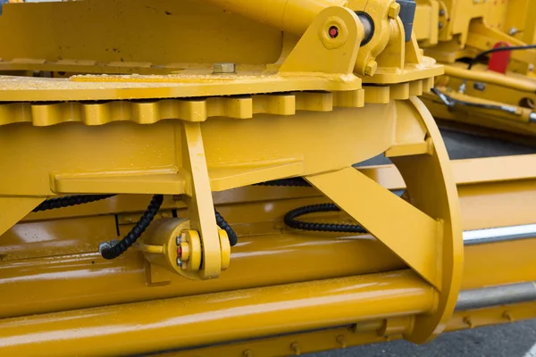 Yellow road scrapper, grader. Stock Image