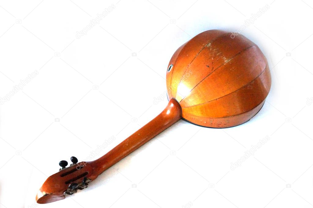 Folk musical instrument domra on wooden background  Stock Image
