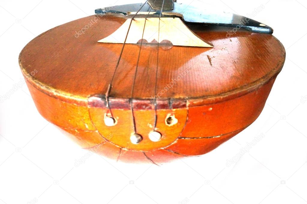 Folk musical instrument domra on wooden background  Stock Image