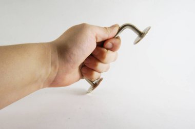 Old steel door handle in hand, on white background, Vintage Door Handle, Metal Door Handle, Door Knob, Antique Door Handle, Soviet Vintage, Antique, Gray, Steel, Close-up, Image Door Handle, USSR , headstock stock image, Nostalgishop
