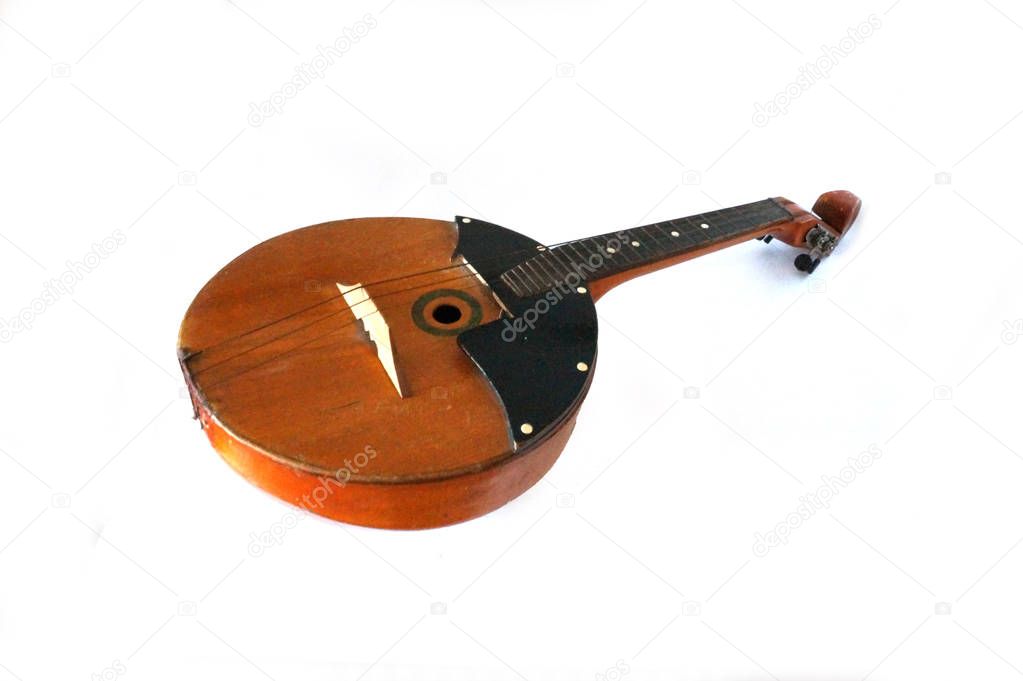Folk musical instrument domra isolated on white, headstock stock image, Nostalgishop