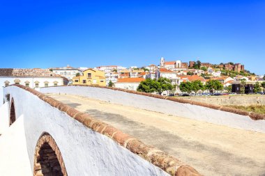 Roman bridge and medieval castle in Silves, Portugal  clipart