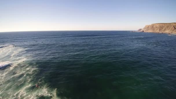 Surfers on waves of Atlantic Ocean in Portugal — Stock Video