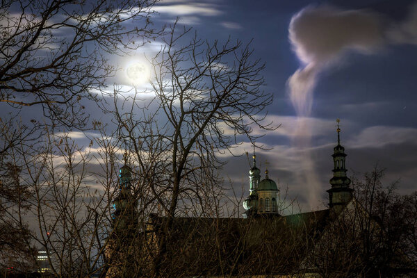 Old building from the park during full moon, Poland