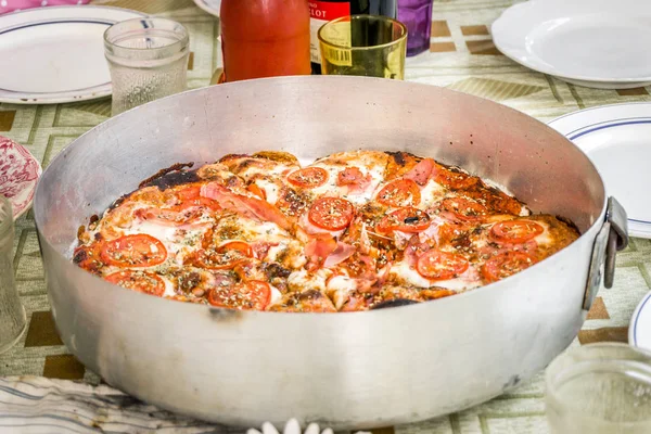 Delicious fresh homemade pizza on the table — Stock Photo, Image