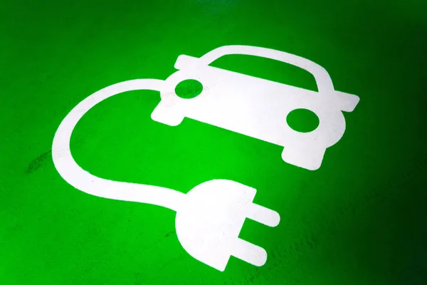 Green and while electric car charging station symbol. — Stock Photo, Image