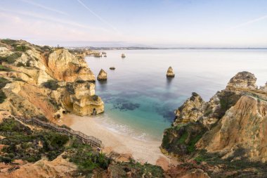 Güzel Camilo Beach önce gündoğumu, Lagos, Algarve, Portekiz