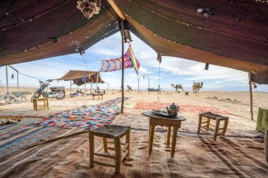 Interior of Bedoiun temporary stretch tent on Agafay desert, Mor clipart