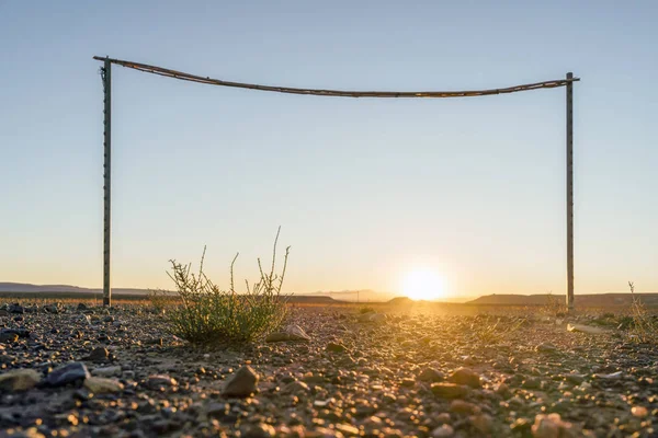 Goles de madera en el desierto al atardecer en Marruecos — Foto de Stock