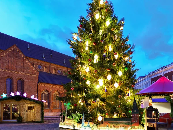 Glowing Christmas tree at the Dome square in old Riga