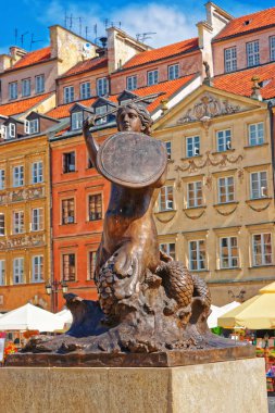 Bronze statue of Mermaid at Old Town Market Place Warsaw clipart