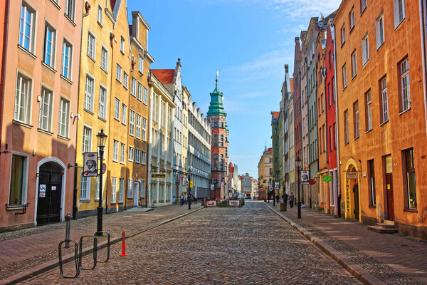 Gdansk, Poland - May 8, 2014: Great Arsenal on Piwna Street in the old city of Gdansk, Poland. People on the background