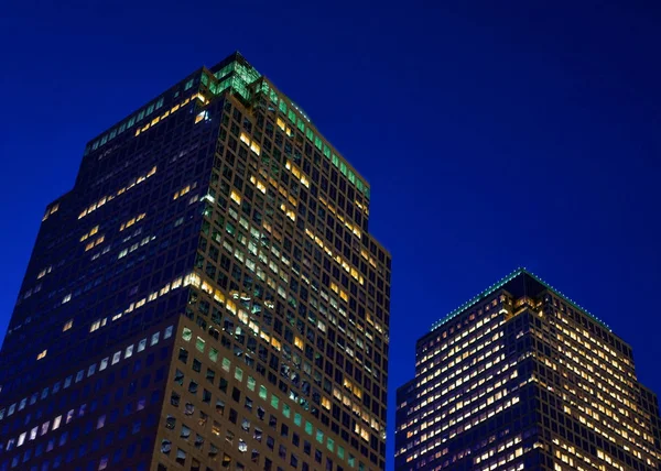 Bottom up view on glass skyscrapers NY USA night — Stock Photo, Image