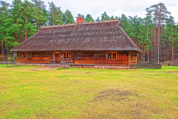 Old traditional wooden house in Ethnographic village in Riga — Stock Photo, Image