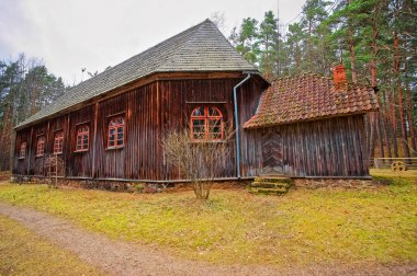 Old buildings in Ethnographic open air village in Riga clipart