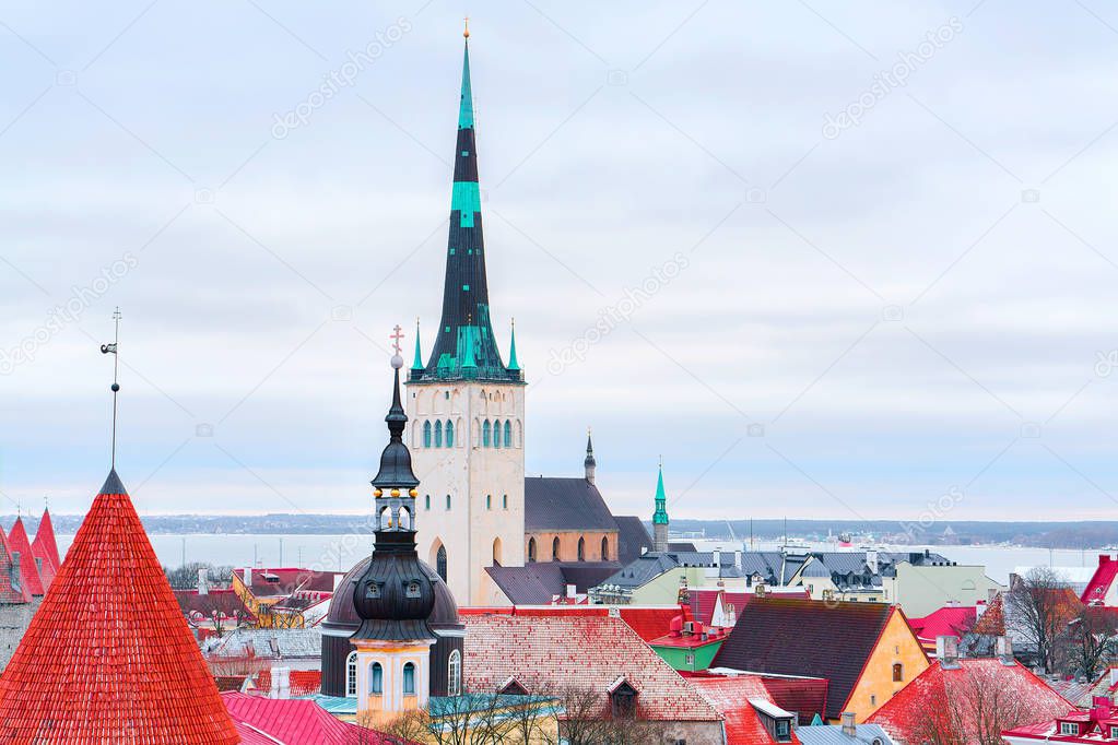 Cityscape with St Olaf Church and defensive walls in Tallinn