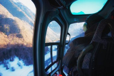 Adam helikopter Swiss Alpine heliport kabin