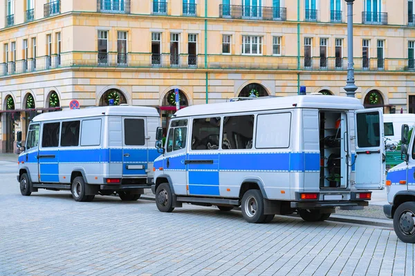 Police vans parked in street in Berlin Germany