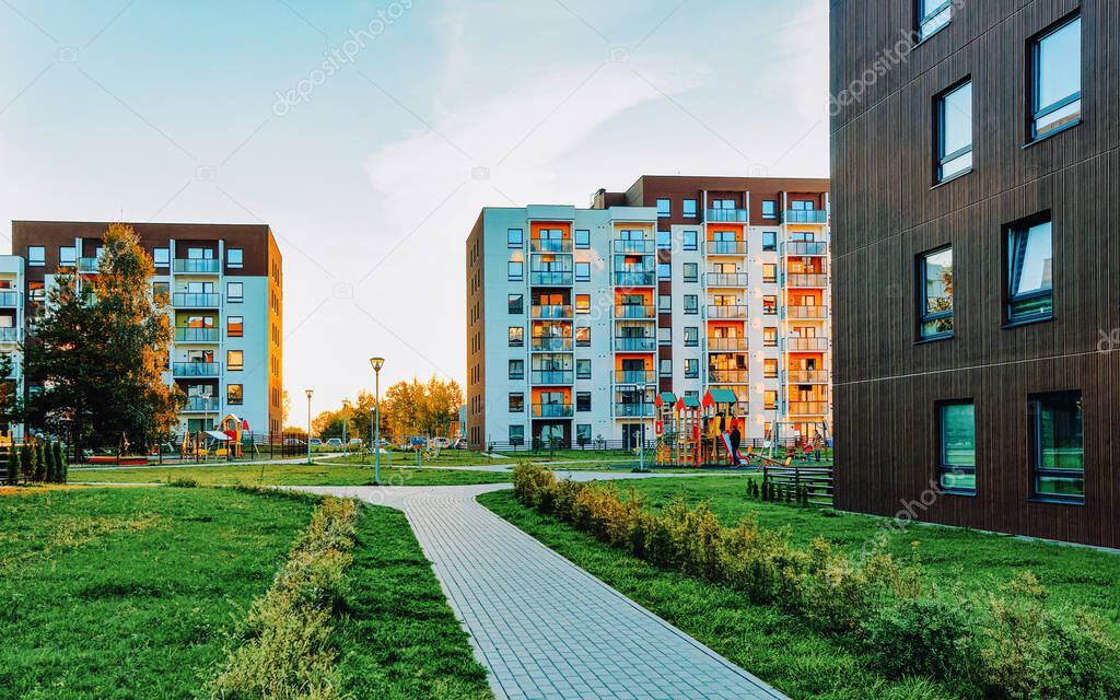 Modern residential apartment and flat building exterior with outdoor facilities