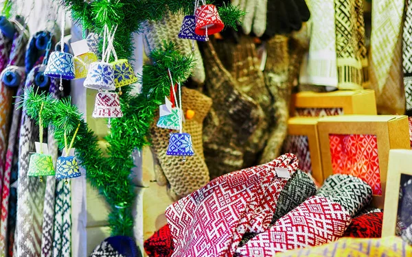 Ornamental warm clothes at stall during Riga Christmas fair new — Stock Photo, Image