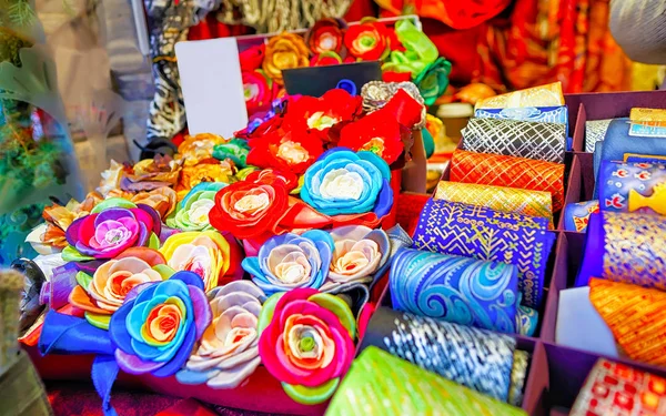 Festive handmade ties and flower brooches at Riga Christmas market reflex — Stock Photo, Image