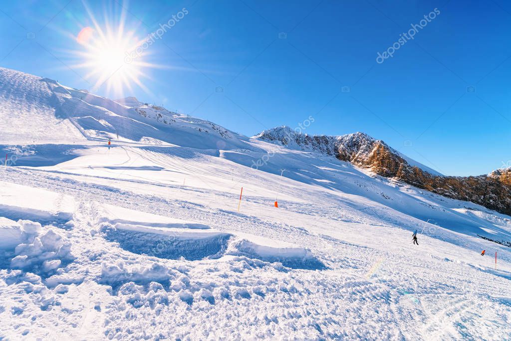 Men Skiers and snowboarders at Hintertux Glacier in Austria