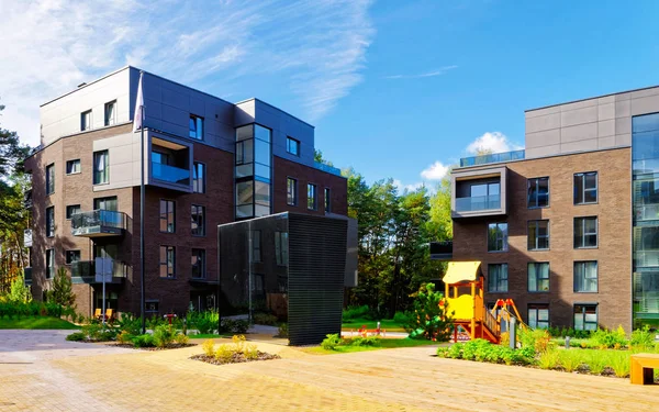 Modern terraced complex of apartment residential buildings reflex