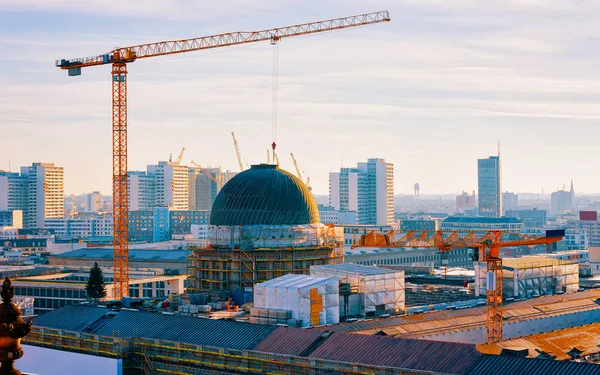 Aerial view on Berlin and lifting crane while construction works reflex — Stock Photo, Image